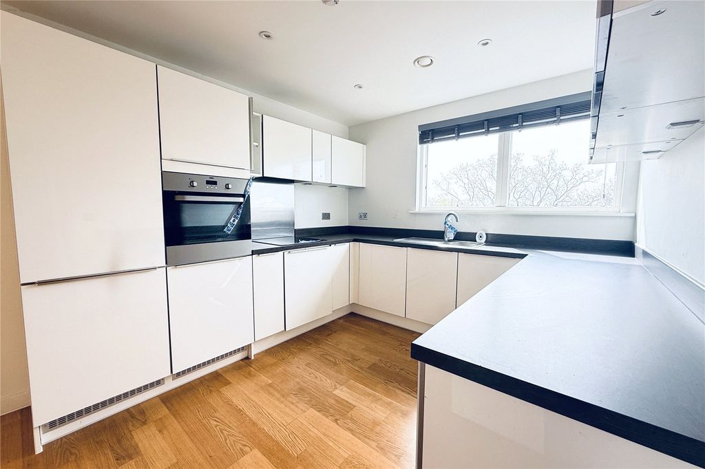 Property photo 2 of 18 Kitchen Area