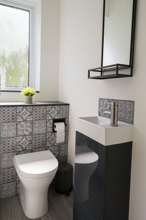 Property photo 2 of 13 Bright And Modern Single Toilet Featuring Stylish ...
