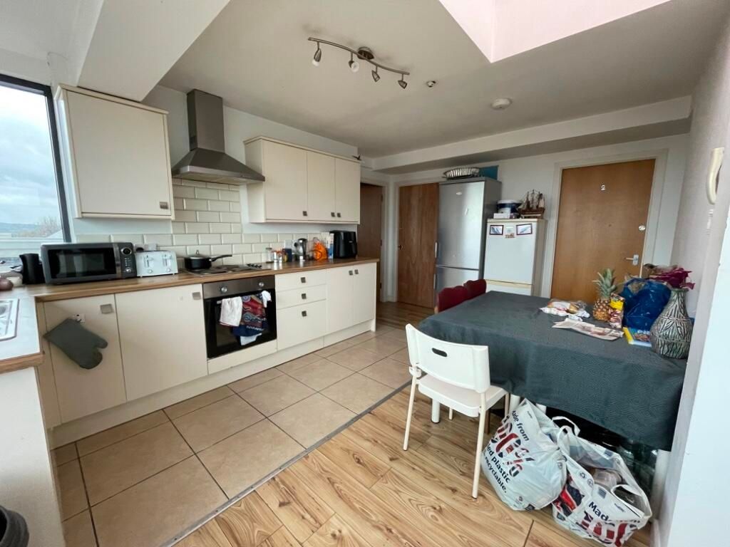 Property photo 3 of 3 Bright And Functional Kitchen Space Featuring Mode...