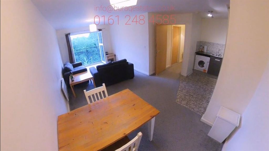 Property photo 2 of 10 Bright Open-Plan Living Area With A Dining Table, ...