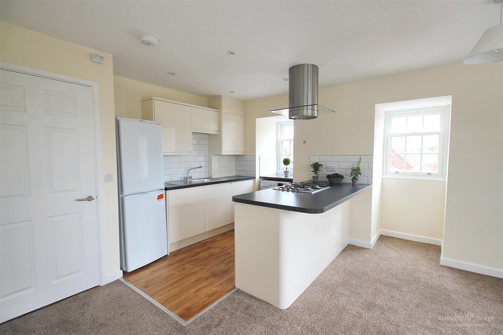 Property photo 2 of 14 Kitchen Area