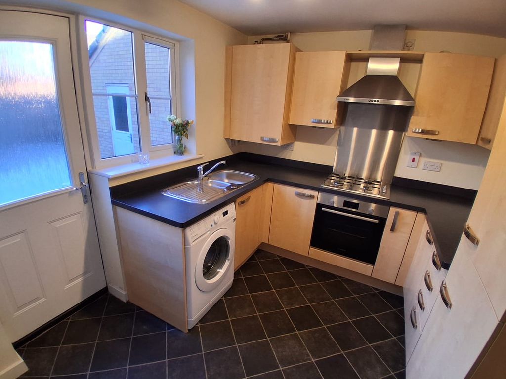 Property photo 3 of 12 Kitchen