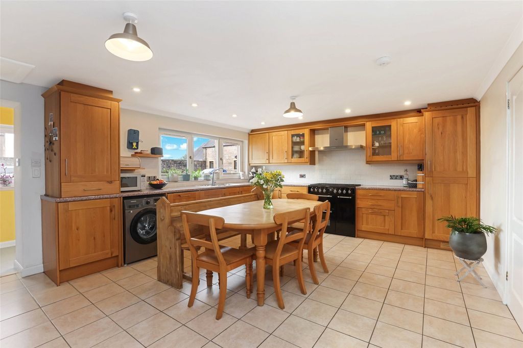 Property photo 2 of 24 Dining Kitchen