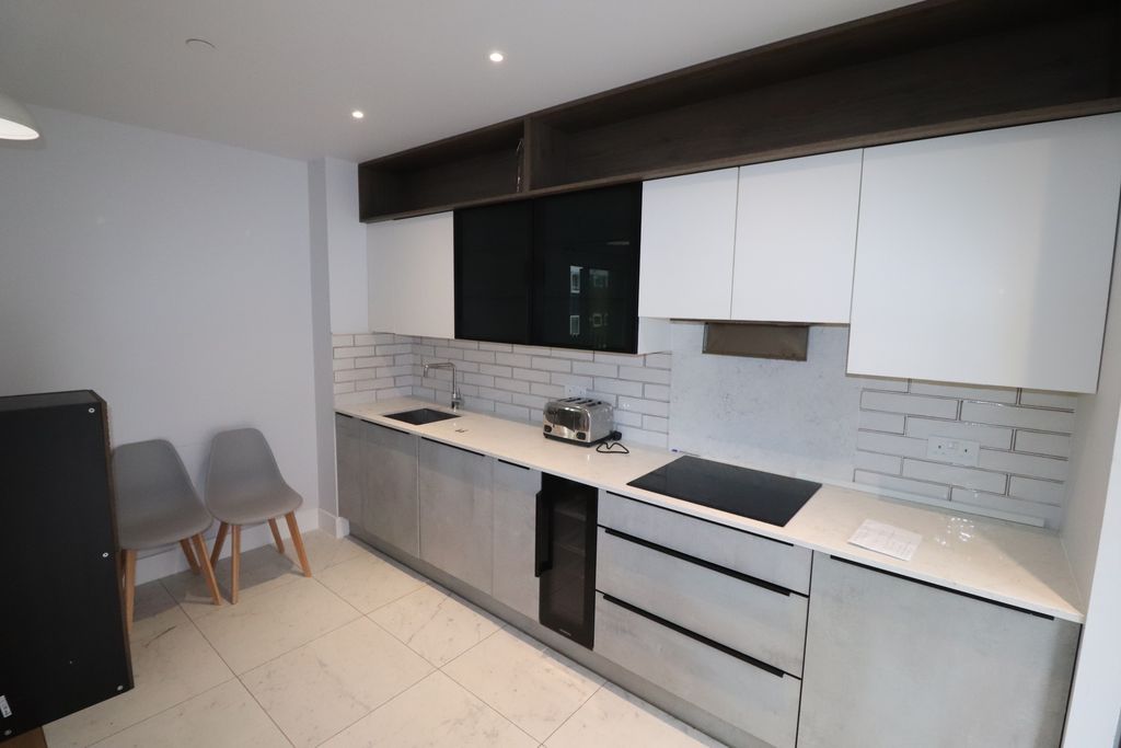 Property photo 3 of 12 Kitchen