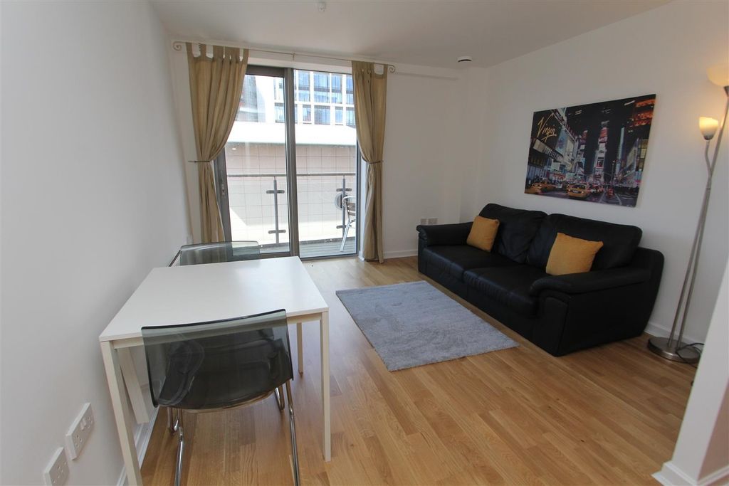 Property photo 1 of 7 Bright Lounge With Leather Sofa And Balcony Access...