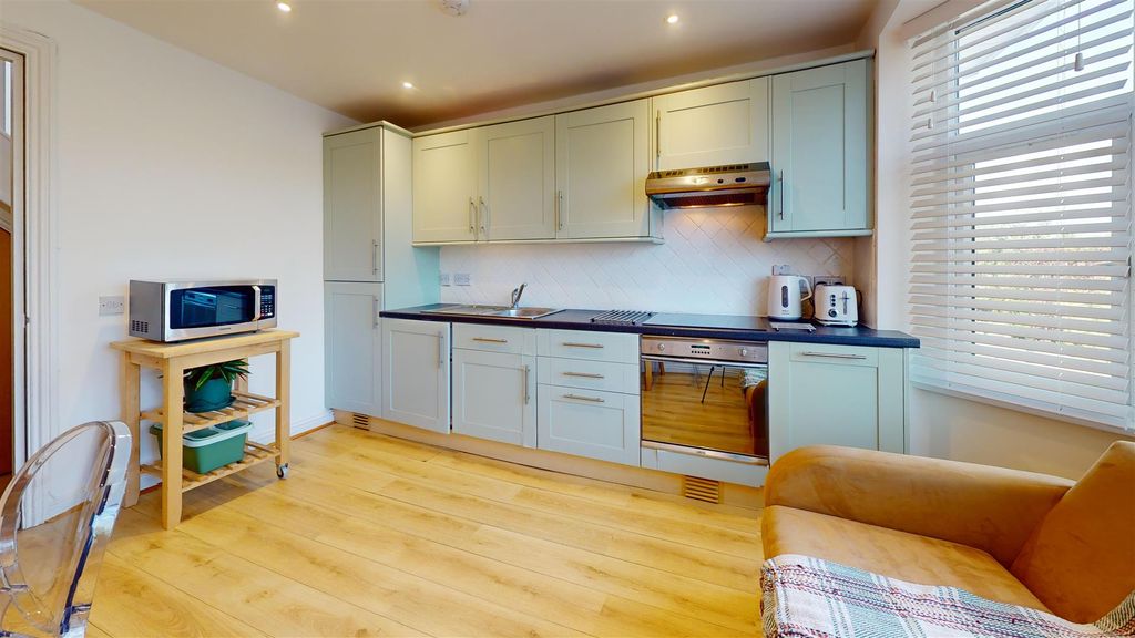 Property photo 1 of 8 Kitchen/Living Room