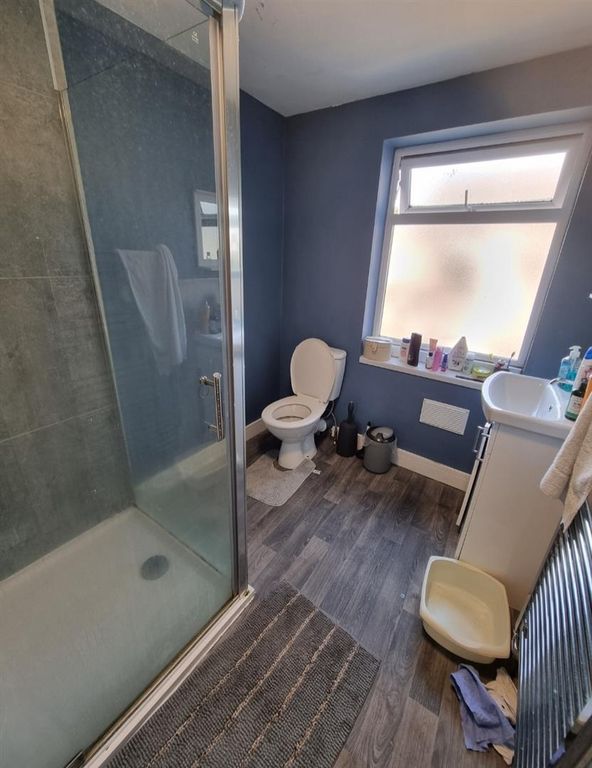 Property photo 2 of 4 Modern Blue Bathroom With A Large Walk-In Shower...