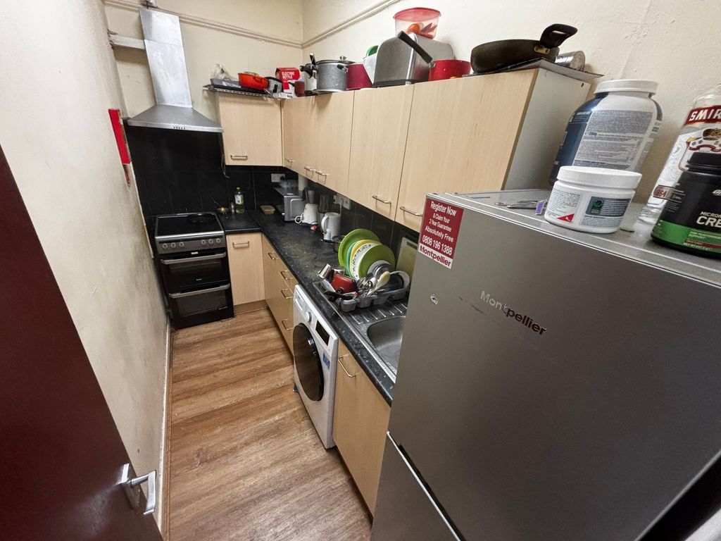 Property photo 1 of 5 Compact Galley Kitchen With Fitted Base And Wall c...