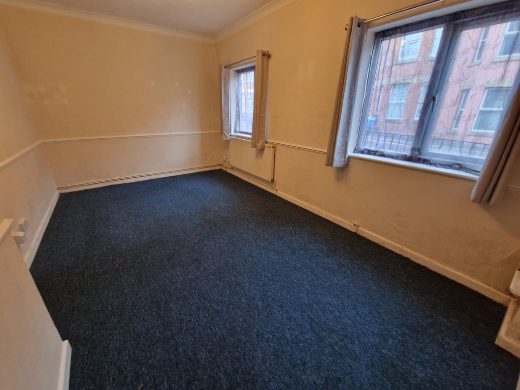 Property photo 3 of 11 Living Room-Angle 2
