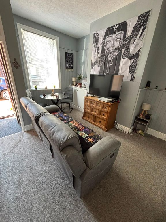 Property photo 1 of 6 Living Area
