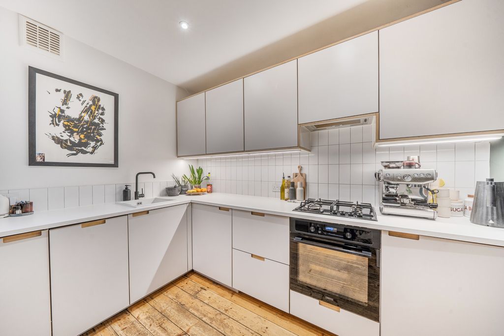 Property photo 3 of 12 Kitchen