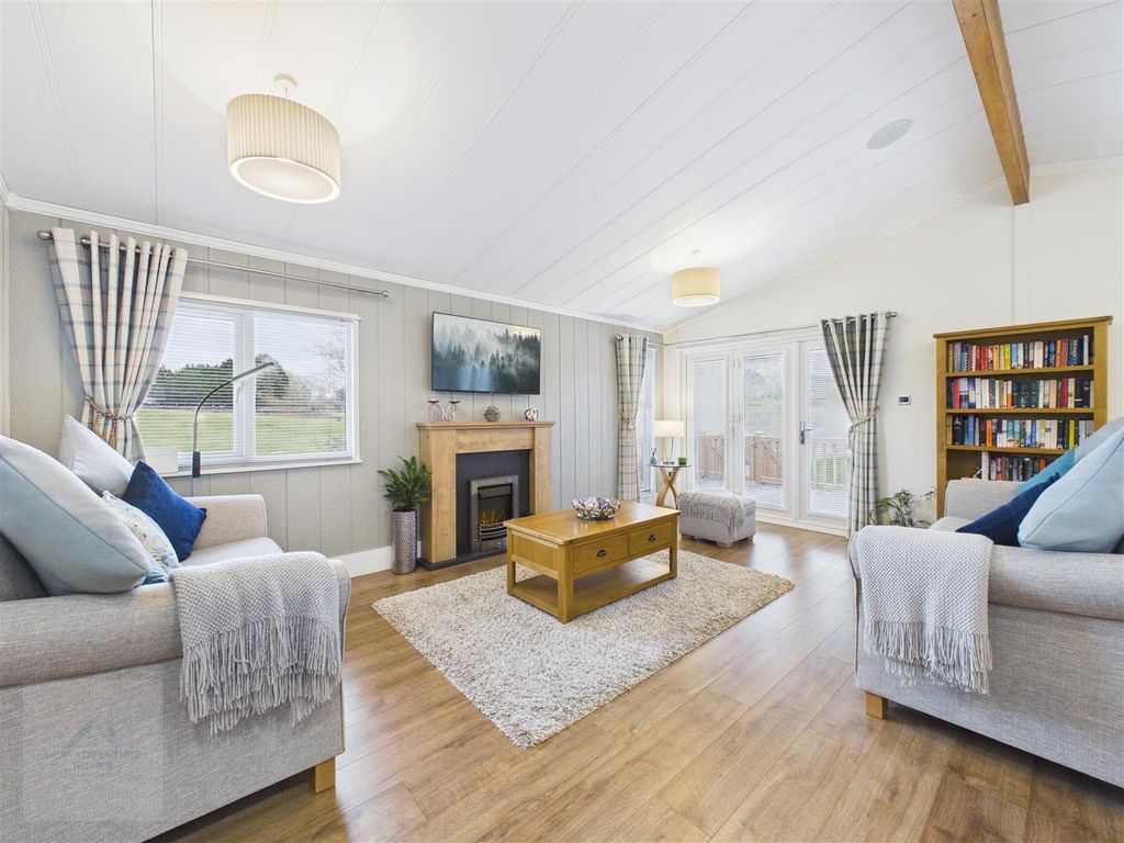 Property photo 3 of 22 Living Area