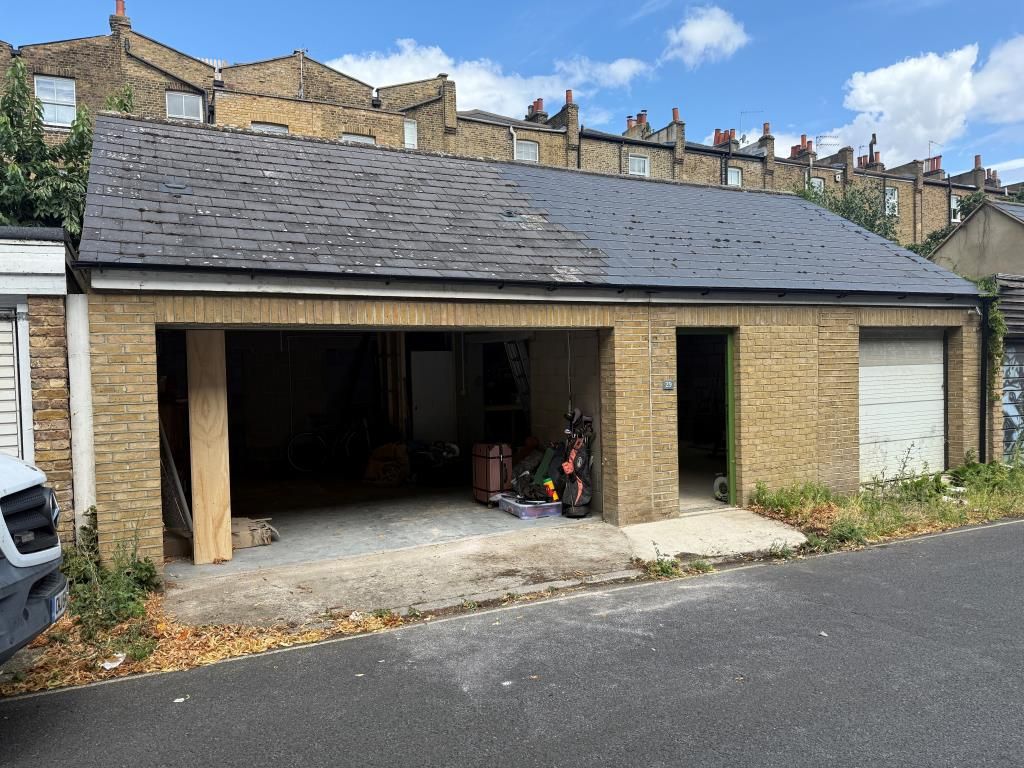 Property photo 2 of 10 View Of Front Elevation With Open Roller Door