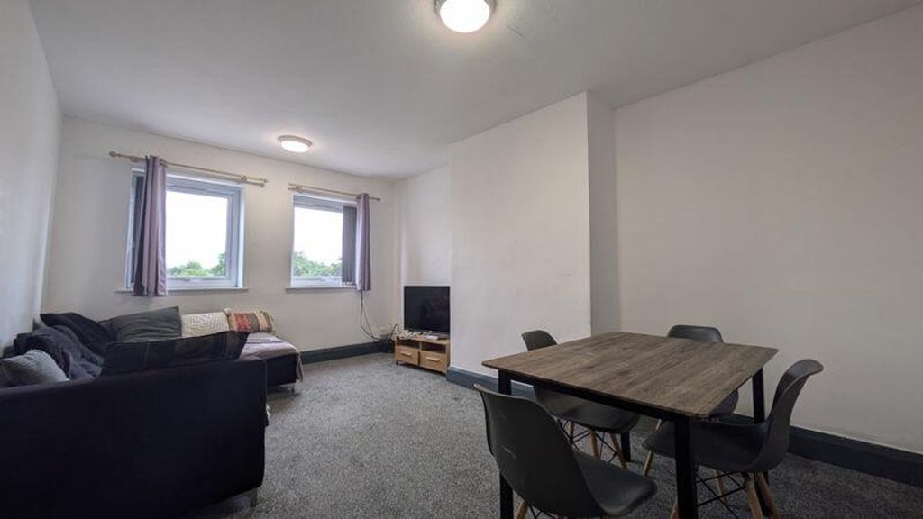 Property photo 1 of 7 A Spacious And Inviting Modern Living Room, Perfec...