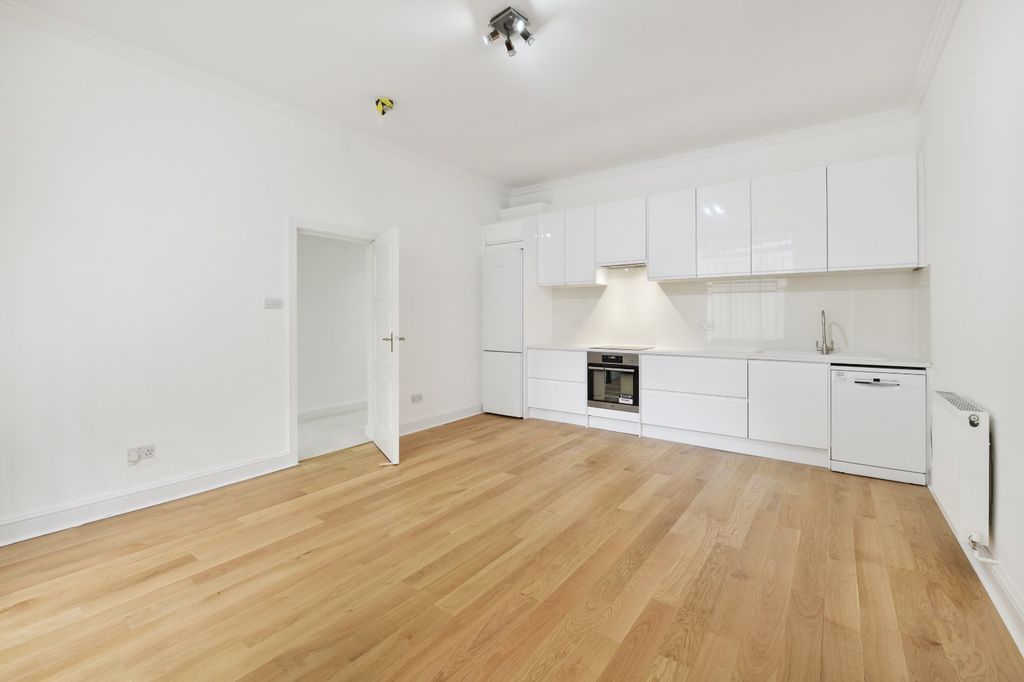 Property photo 1 of 11 Open Plan Kitchen