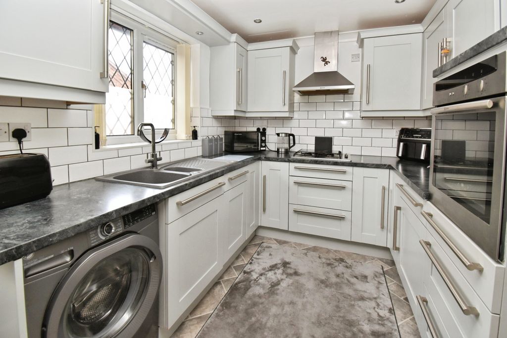 Property photo 2 of 16 Kitchen Area