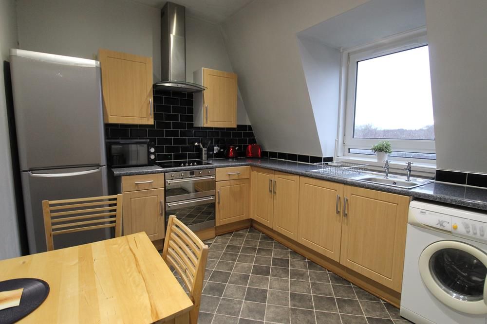 Property photo 3 of 7 Kitchen