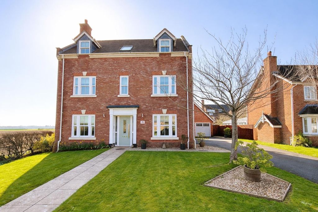 Property photo 1 of 41 Elegant Red Brick House In Daylight.Png