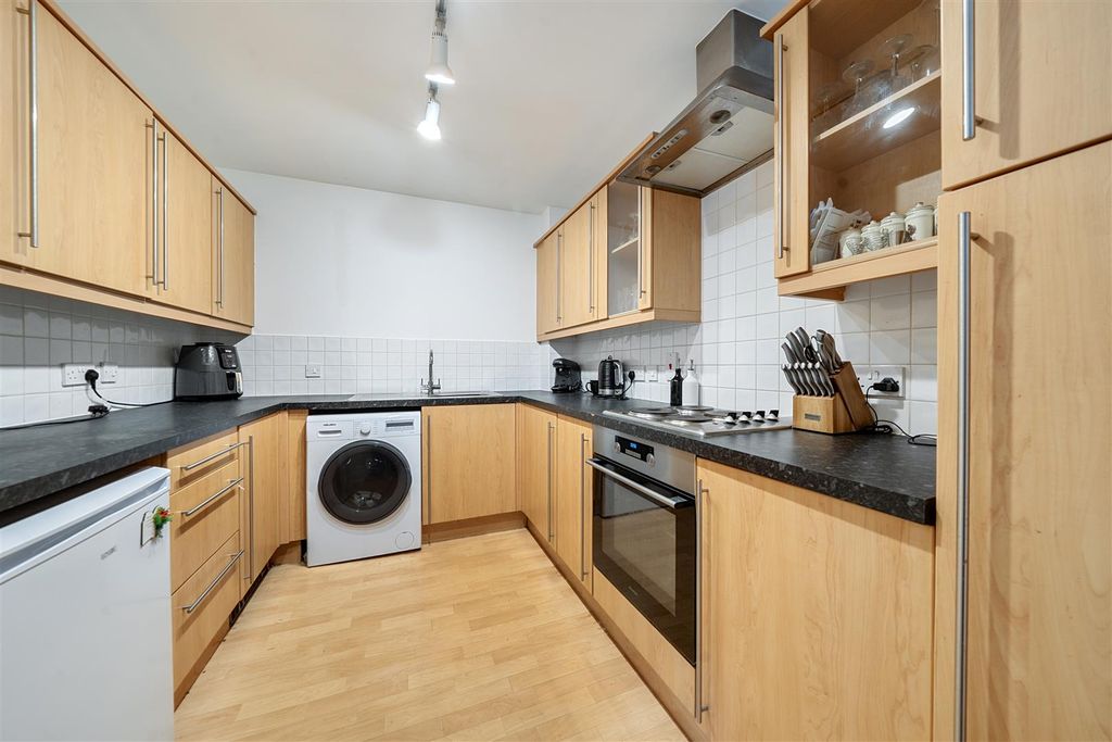 Property photo 3 of 17 Kitchen Area