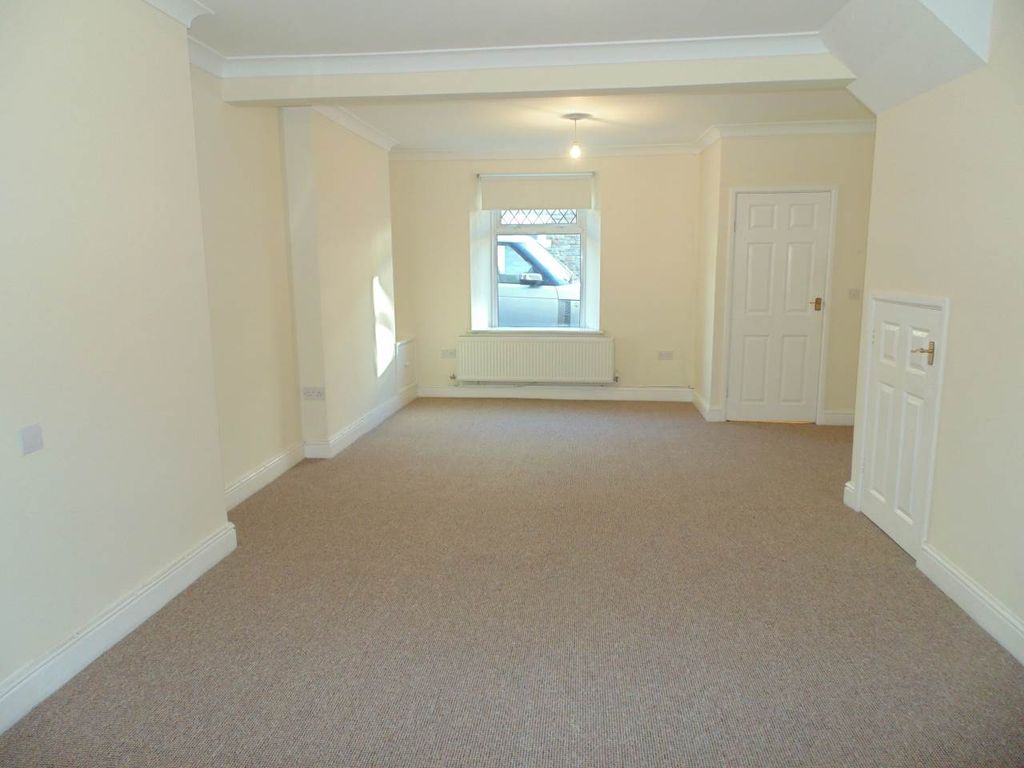 Property photo 2 of 12 Living Room 1