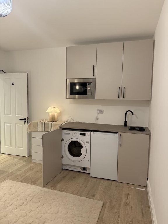 Property photo 2 of 10 Utility Room