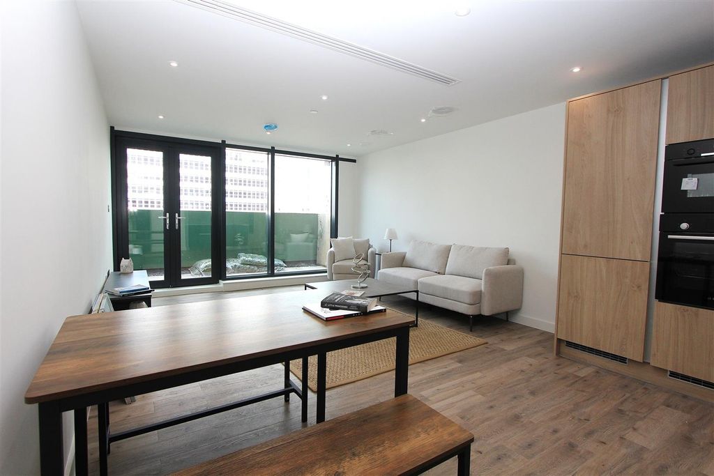 Property photo 1 of 10 Bright Open-Plan Living Area With Balcony Access...