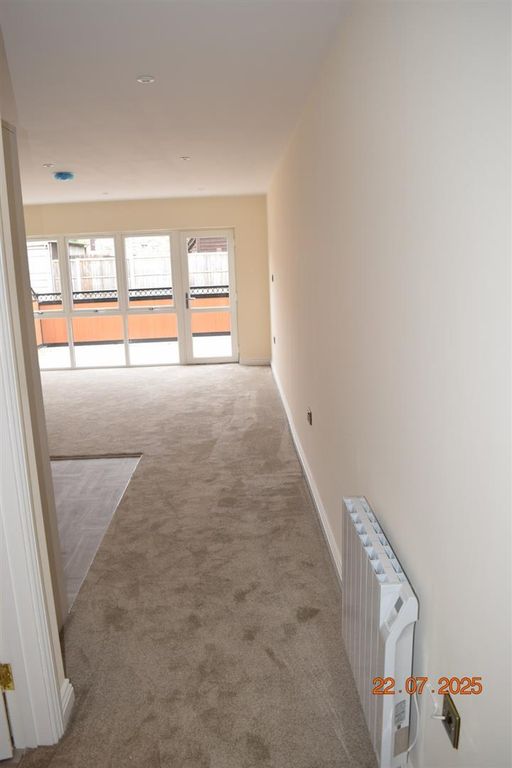 Property photo 3 of 23 Leading Into Kitchen/Living Room