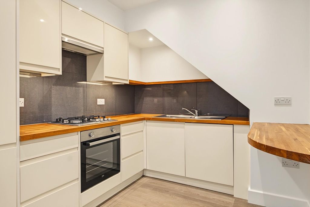 Property photo 3 of 12 Kitchen