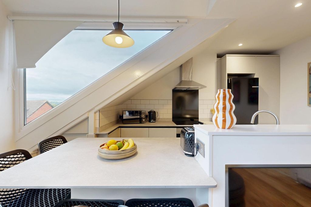 Property photo 3 of 18 Bright And Modern Living Room With Ample Natural l...