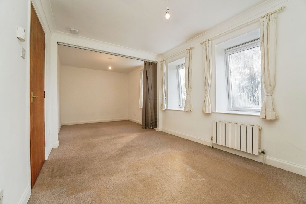 Property photo 3 of 8 Living Area