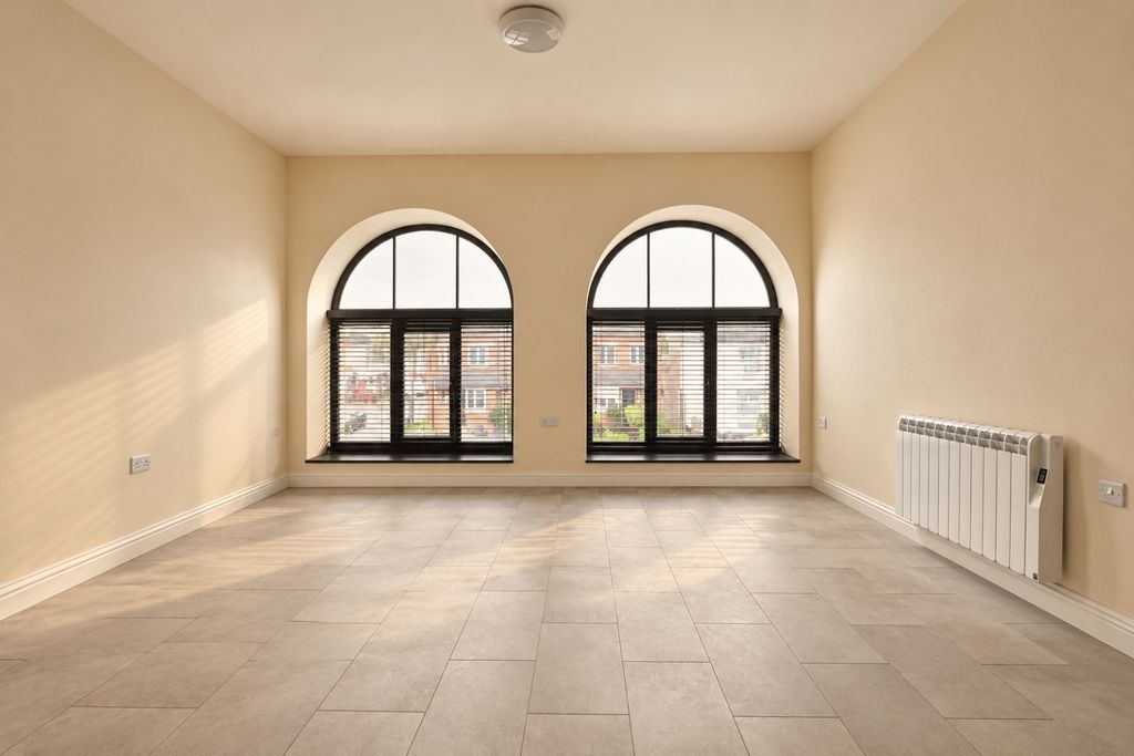Property photo 2 of 7 Warm Symmetry In An Empty Room
