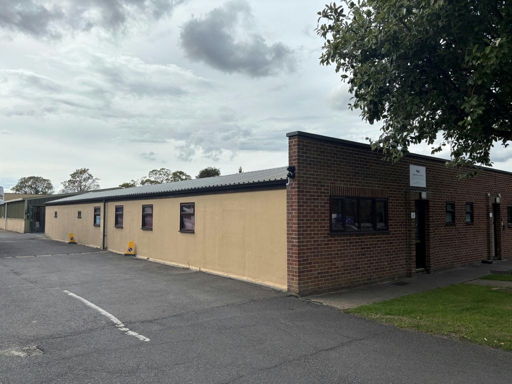 Property photo 3 of 4 Unit 4 Side.Jpg