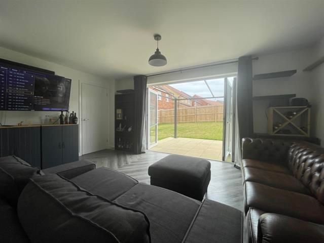 Property photo 3 of 8 Living Room