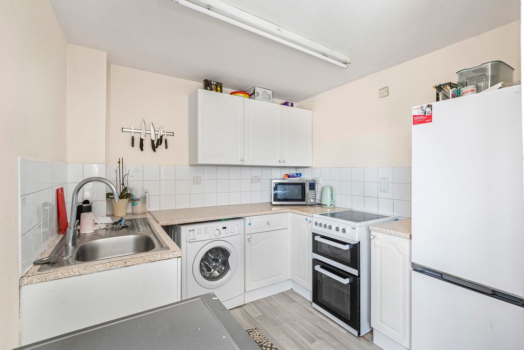 Property photo 3 of 12 Kitchen