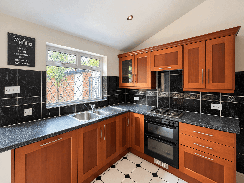 Property photo 2 of 13 Inviting Kitchen With Garage View