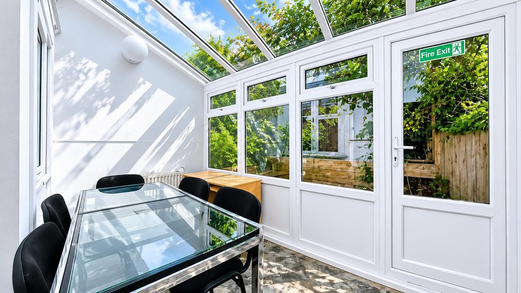 Property photo 2 of 12 Conservatory
