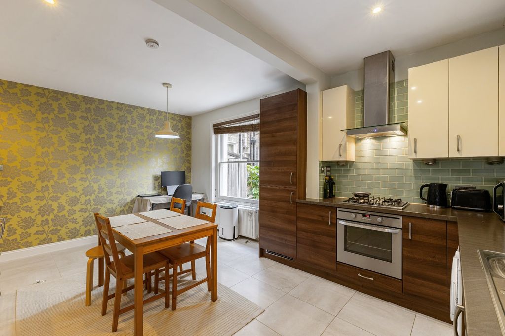 Property photo 3 of 9 Kitchen Dining Room
