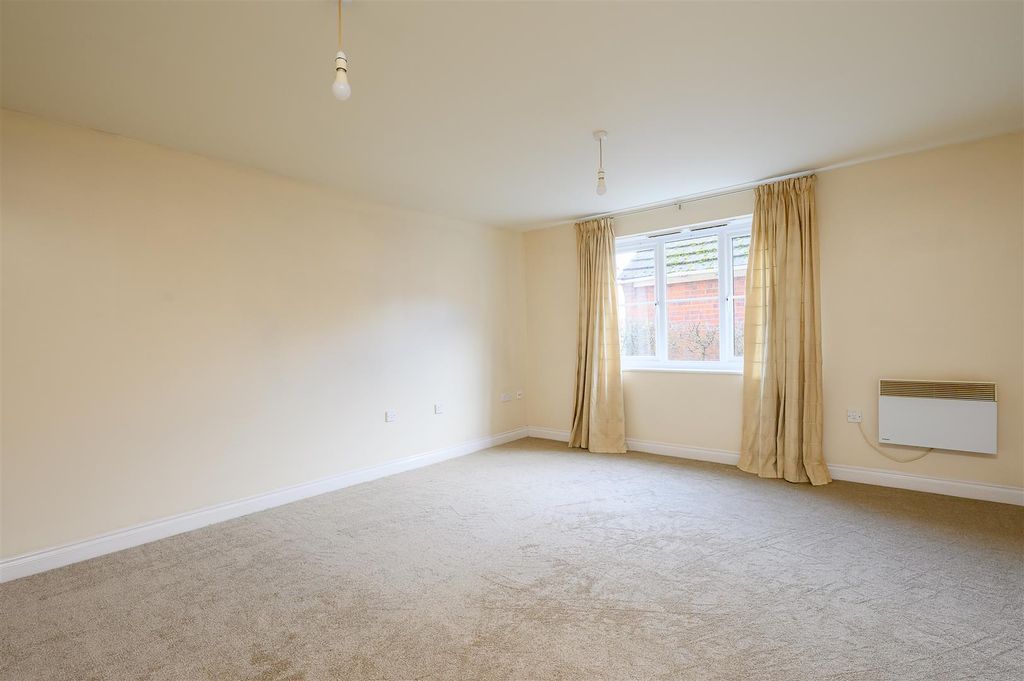 Property photo 3 of 12 Living Room 1