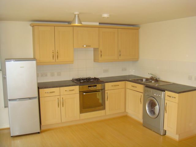 Property photo 2 of 7 Kitchen Area