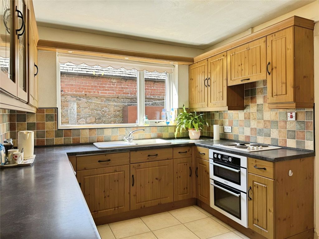 Property photo 2 of 12 Kitchen