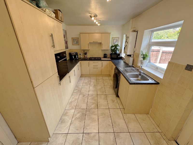Property photo 3 of 24 Dining Kitchen