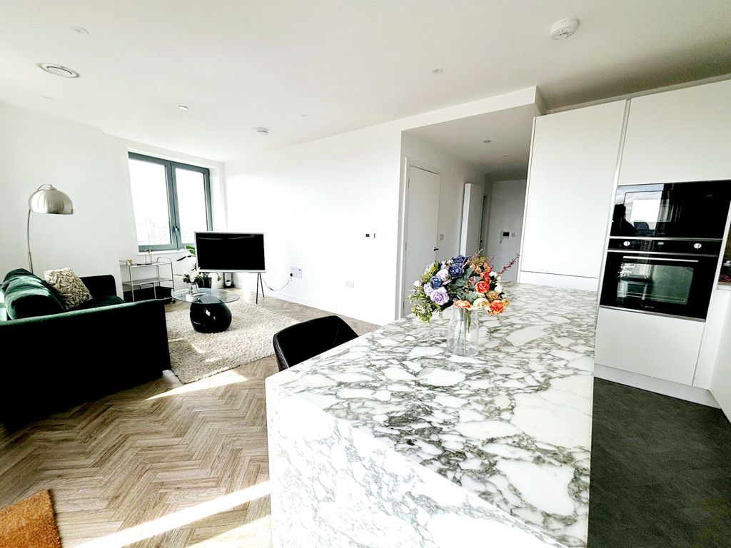 Property photo 1 of 7 Situated On The 17th Floor Of A Modern Residential Development On Gillender Street, E3, This Bright And Well-Presented One-Bedroom Apartment Offers Contemporary Living With Impressive Natural Light Throughout.