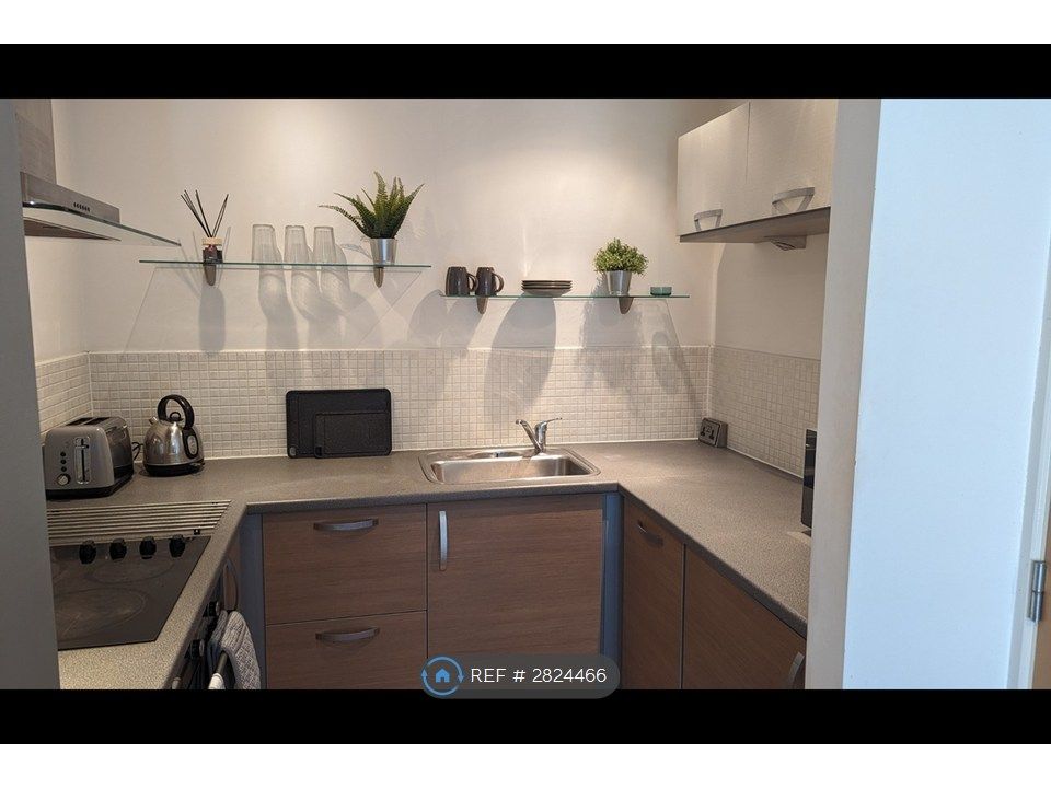 Property photo 3 of 9 Kitchen