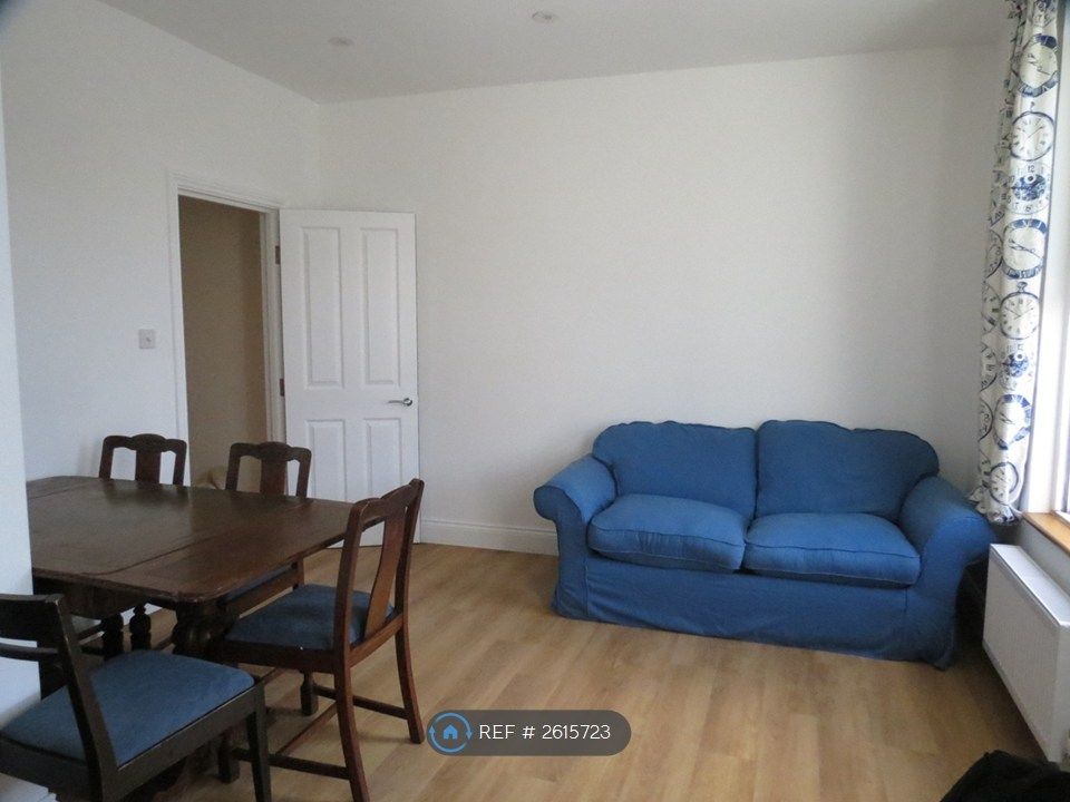 Property photo 2 of 13 Sitting Room - Dining Table And Sofa Bed
