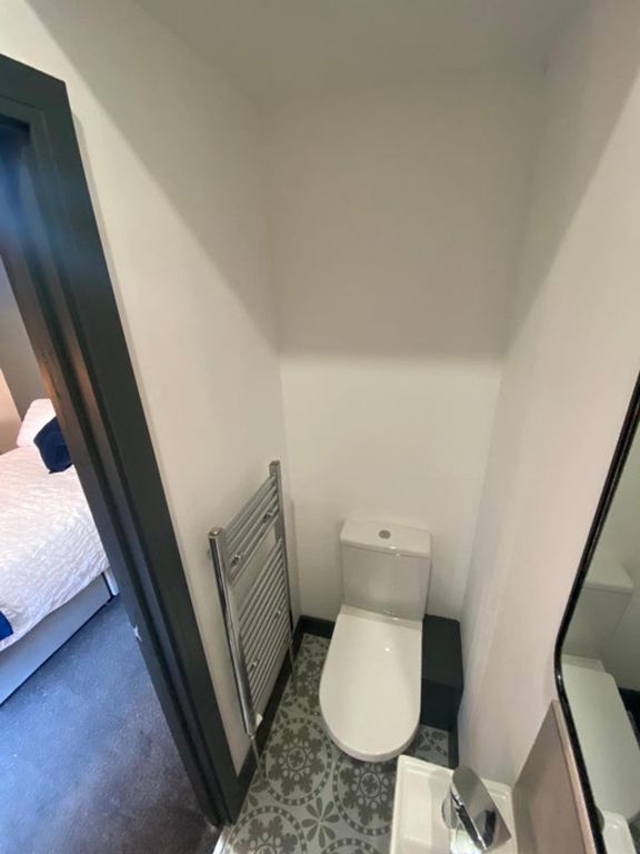 Property photo 2 of 6 A Stylish And Modern Single Toilet Featuring Sleek...