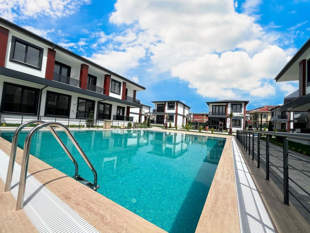 Property photo 1 of 25 Newly Built Sea View Istanbul Property For Sale - Main View Of Apartments And Shared Pool