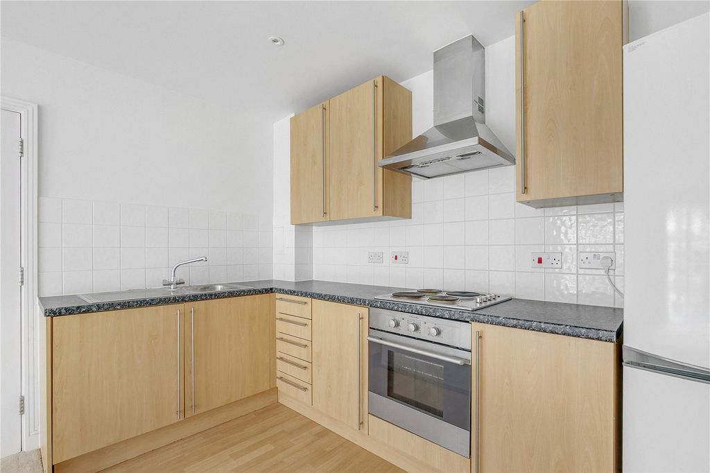 Property photo 3 of 8 Kitchen