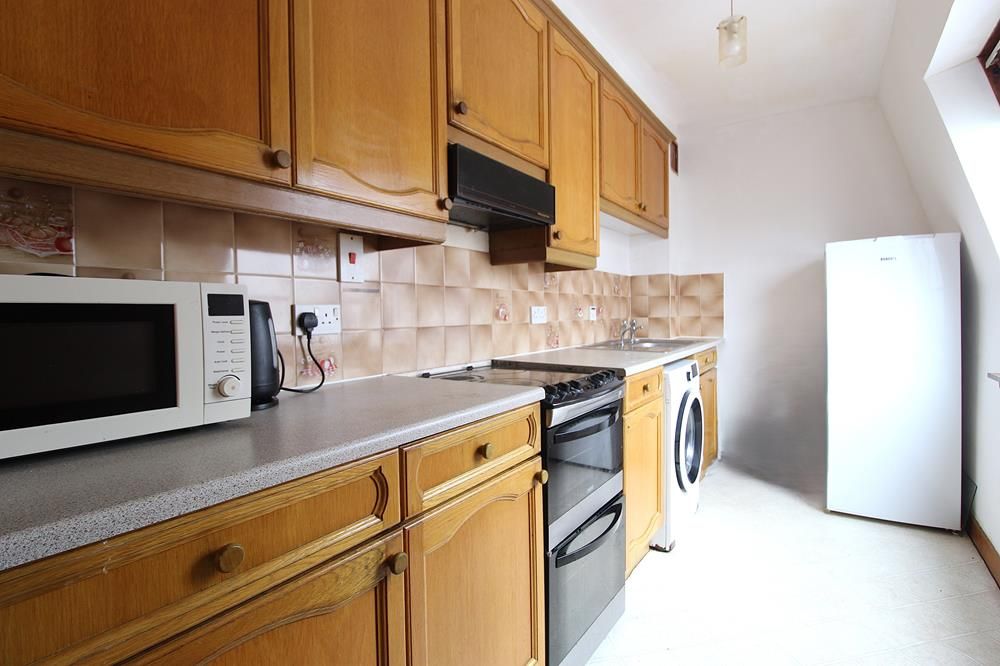 Property photo 3 of 8 Kitchen