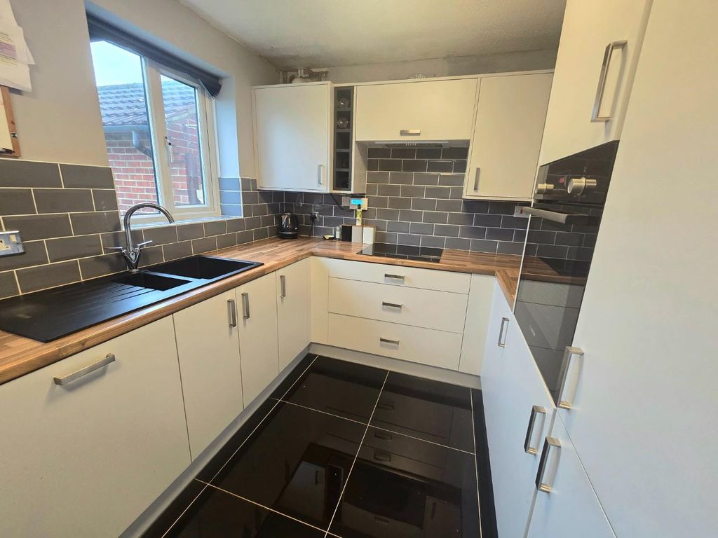 Property photo 2 of 13 Kitchen