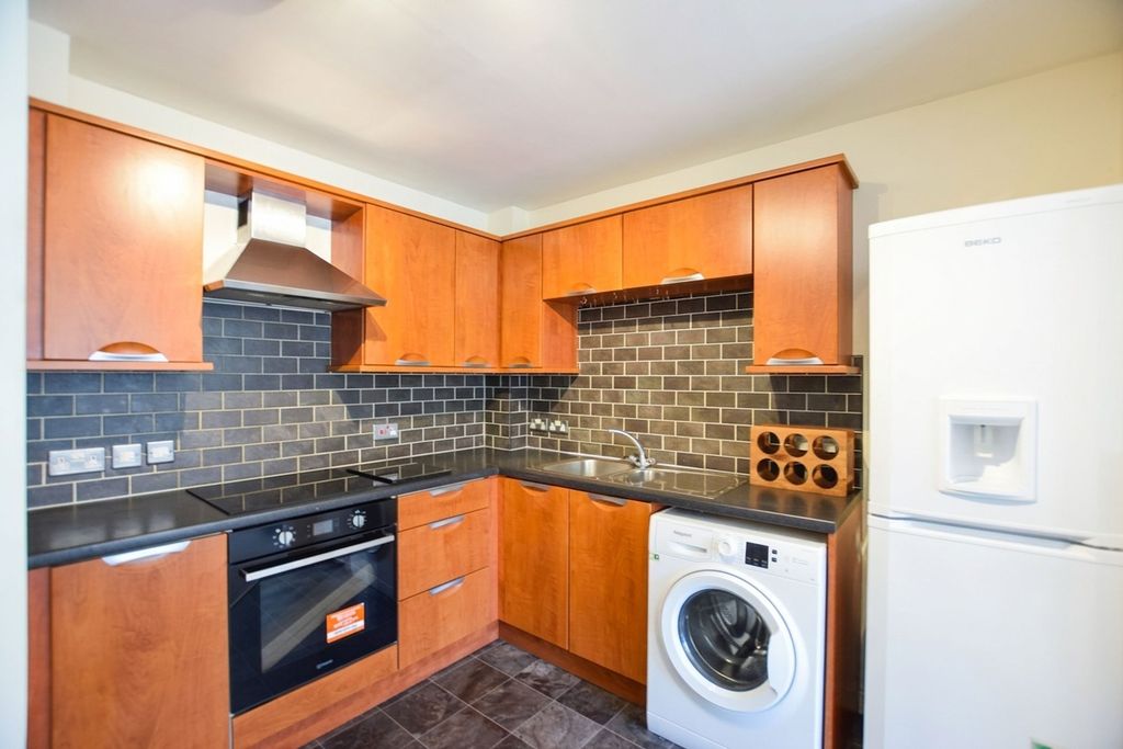 Property photo 2 of 8 Kitchen